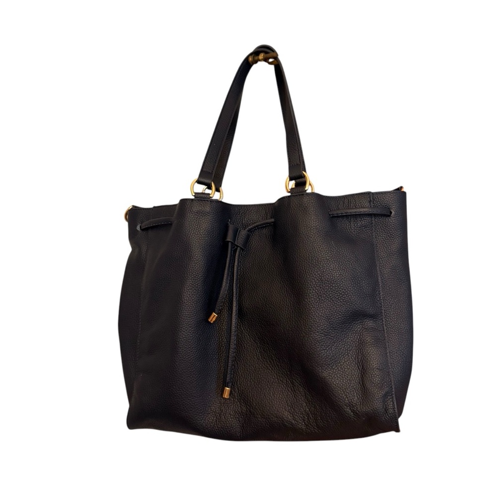 Laggo purse.  Navy blue leather with gold accents. Excellent condition!